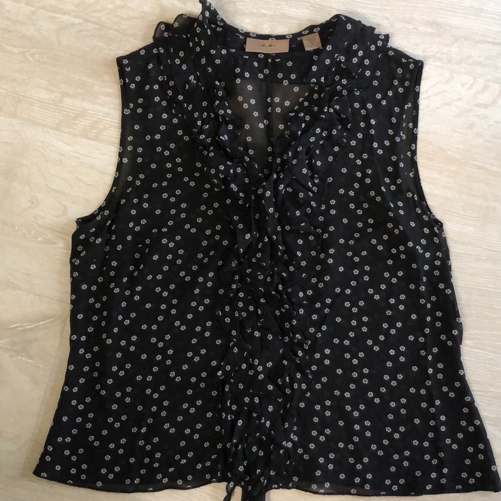 Black and white sleeveless silk top